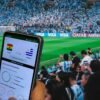 Pantalla del Fixture 2026 de Mercado Pago con pronósticos y tabla de posiciones.